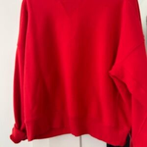 Offline Bright Red Sweatshirt.  Size L. NOTE:small cut in fabric shown in pics